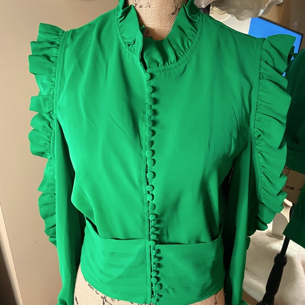 Green open sleeve blouse with flirty details